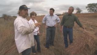 NPAT member Mike Williams talks with Laura and George Bush about Prairie Chapel Ranch tallgrass prairie restoration